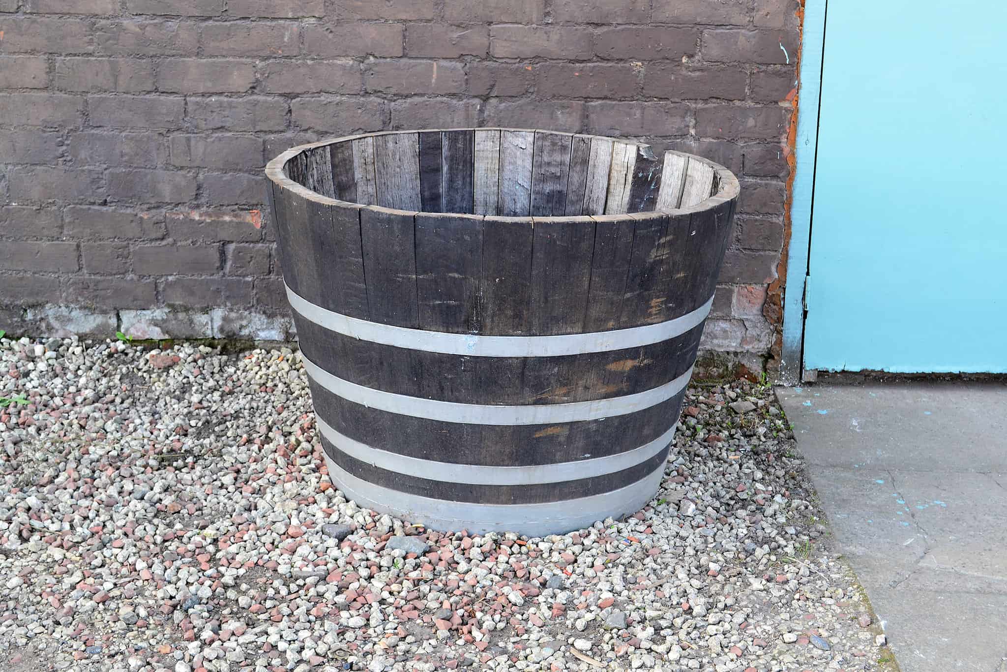 large whisky barrel planter