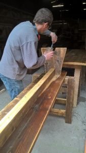 Volunteer working on a bench